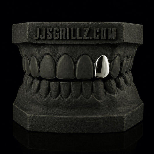 Custom Silver 925 Sterling Tooth Cap on a black Custom Mould that features the brand 'JJSGRILLZ.COM' on it.