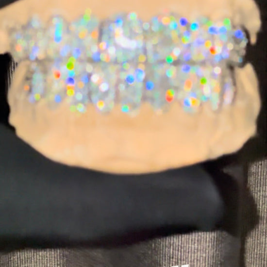 Video showcasing a custom grillz sets shine fire and brilliance. Made fully by JJ’s Grillz