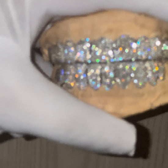 Video holding JJ’s Lab Diamond Grillz showcasing the grillz brilliance and sparkle. Made by JJ’s Grillz