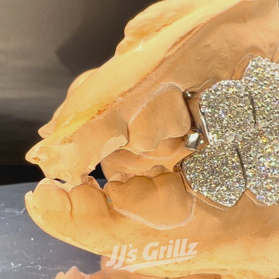 Luxury VVS Moissanite Grillz made by JJ's Grillz rotating on a 360 Display.